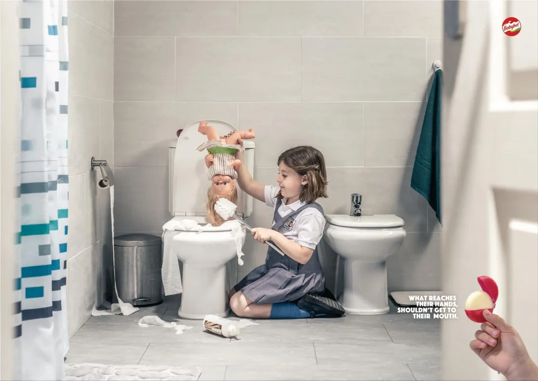 Babybel "What reaches their hands, shouldn't get to their mouth."